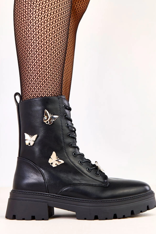 Scarponi da donna neri decorati con... Scarponi da donna neri decorati con...