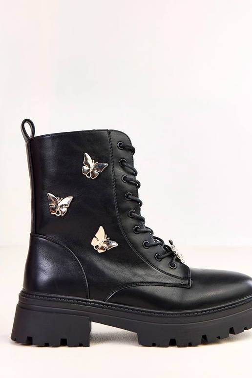 Scarponi da donna neri decorati con... Scarponi da donna neri decorati con...