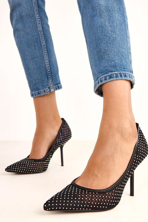 Décolleté neri in tessuto rete... Décolleté neri in tessuto rete...