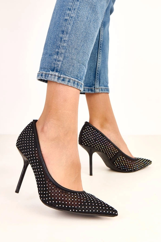 Décolleté neri in tessuto rete... Décolleté neri in tessuto rete...