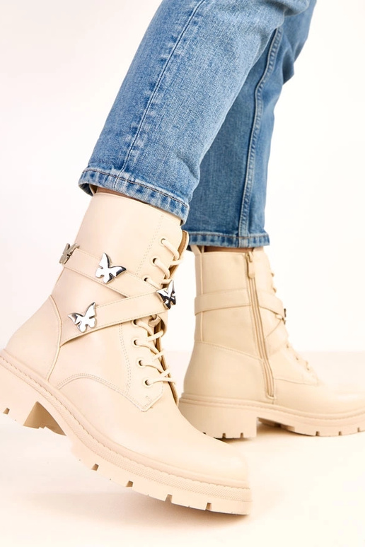 Stivaletti sabbia decorati con... Stivaletti sabbia decorati con...