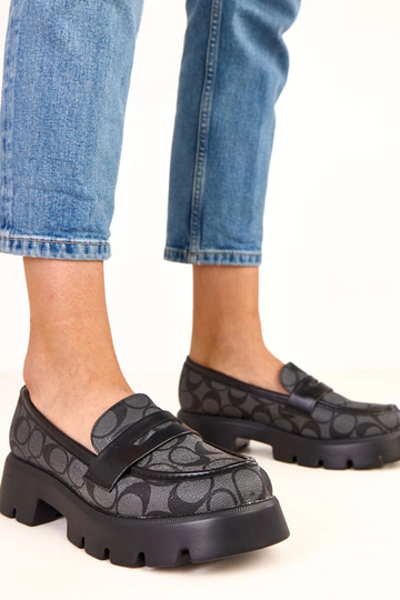 Mocassini neri con motivo...