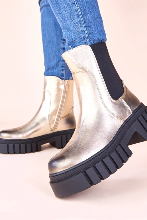 Stivaletti dorati con piattaforma e...