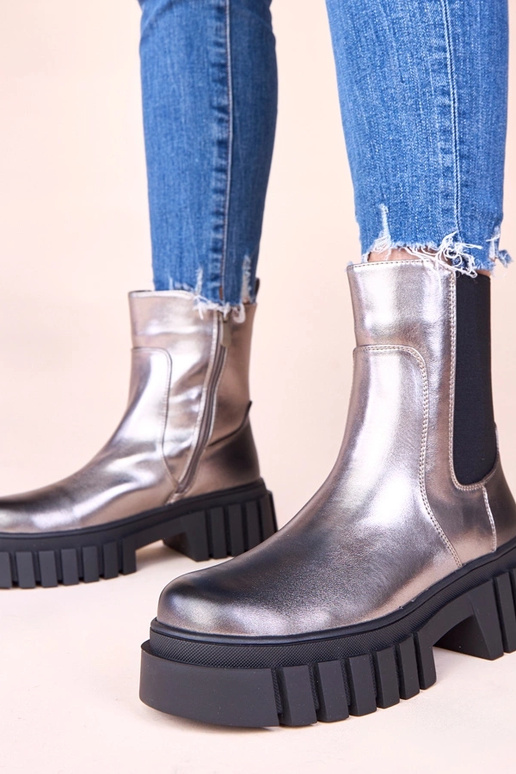 Stivaletti argentati con piattaforma...
