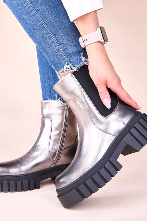 Stivaletti argentati con piattaforma...