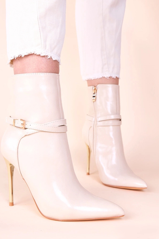 Stivaletti sabbia con tacco dorato e...