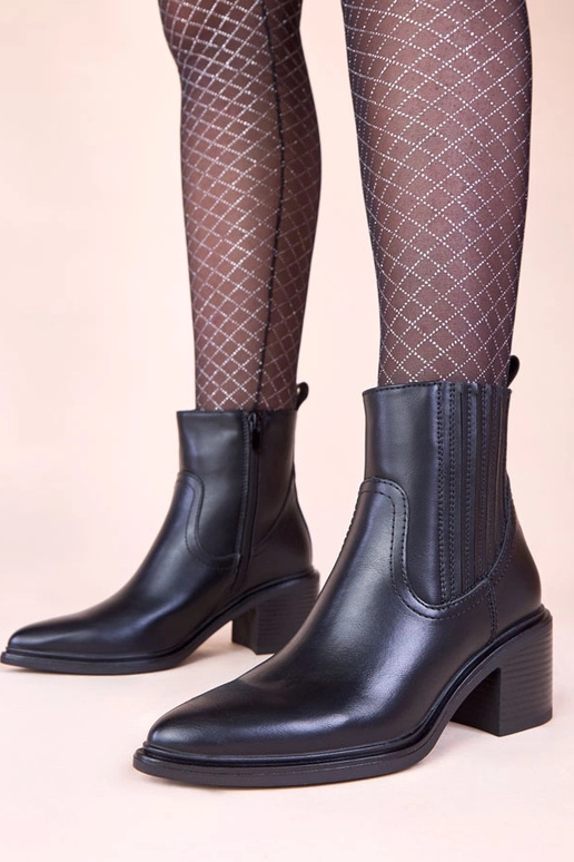 Stivaletti neri su tacco con elastico...