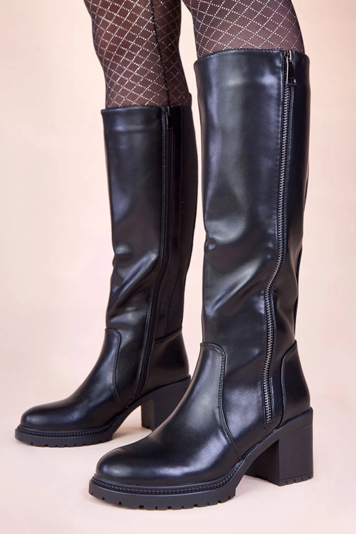 Stivaletti neri con tacco e elastico...