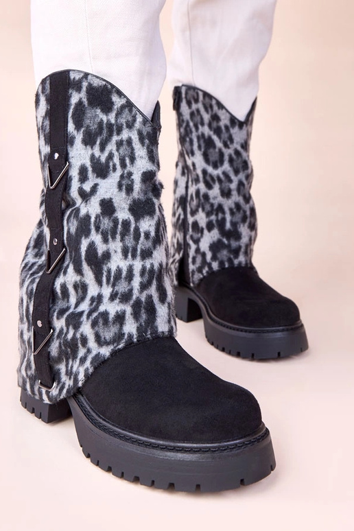 Stivaletti neri con gambale a motivo...