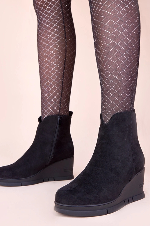 Stivaletti neri con plateau in suede...