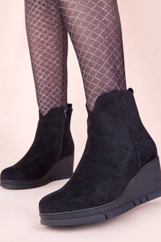 Stivaletti neri con plateau in suede...