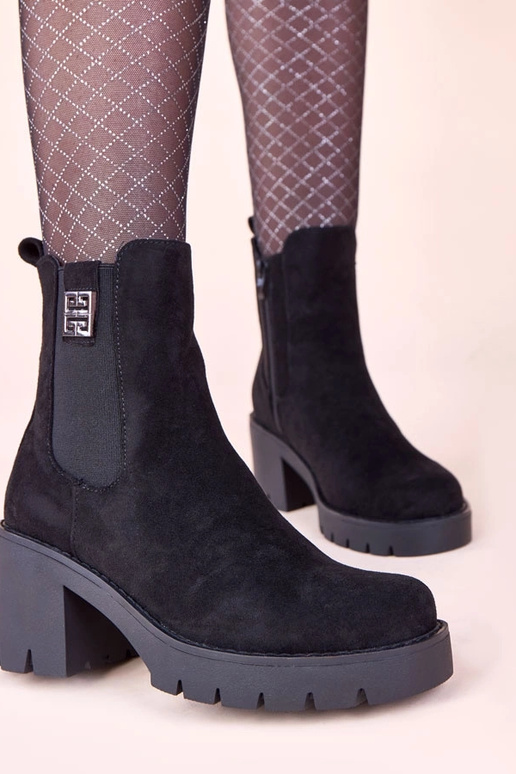 Stivaletti neri con tacco e elastico...