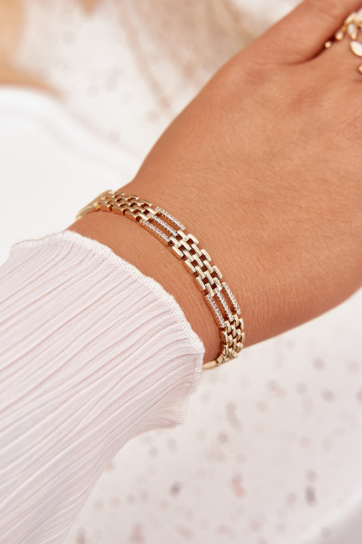 Un braccialetto Femminile Realizzato in acciaio chirurgico con gli occhi scintillanti colore dorato