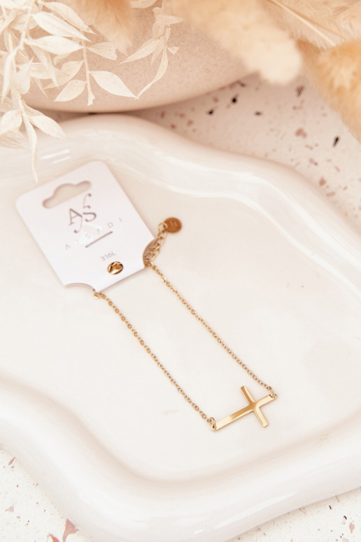 Un braccialetto Con una croce Stal Chirurgiczna colore dorato