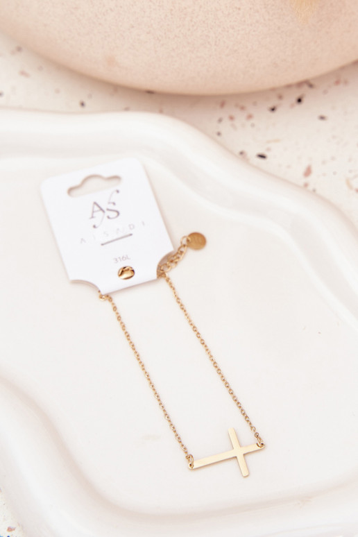 Un braccialetto Con una croce Stal Chirurgiczna colore dorato