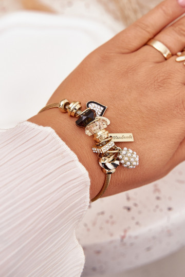 Un braccialetto z ZaAieszkami Charms colore dorato