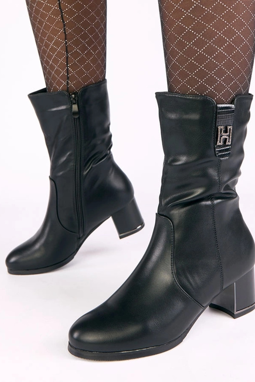 Stivaletti neri foderati con tacco e...