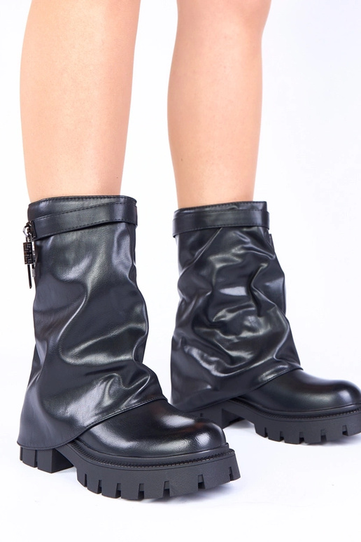 Stivali neri con platforma e gomito...
