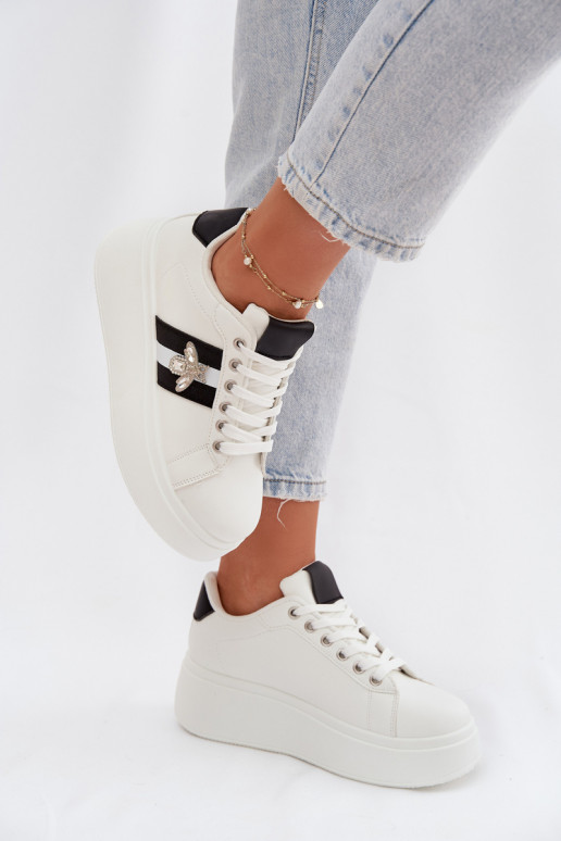 Scarpe modello sneakers Femminile con una piattaformaPrzypinką Colore bianco Palvessa