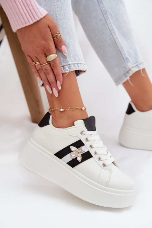 Scarpe modello sneakers Femminile con una piattaformaPrzypinką Colore bianco Palvessa