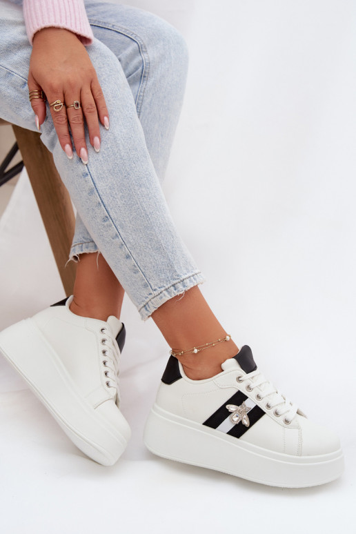 Scarpe modello sneakers Femminile con una piattaformaPrzypinką Colore bianco Palvessa