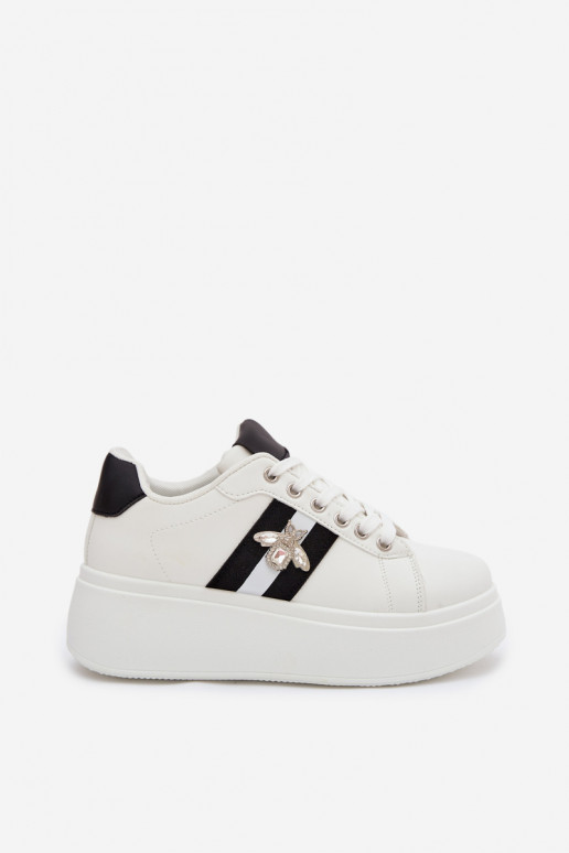 Scarpe modello sneakers Femminile con una piattaformaPrzypinką Colore bianco Palvessa