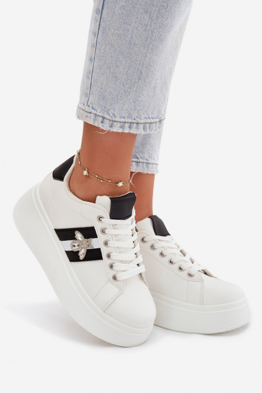 Scarpe modello sneakers Femminile con una piattaformaPrzypinką Colore bianco Palvessa
