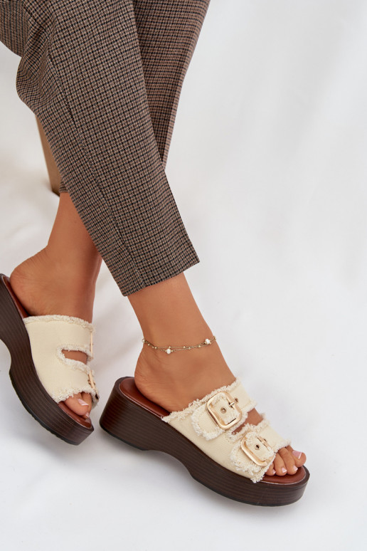 Infradito da donna con piattaforma color oro con fibbie color avorio