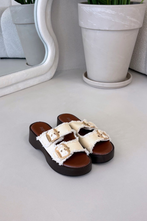 Infradito da donna con piattaforma color oro con fibbie color avorio