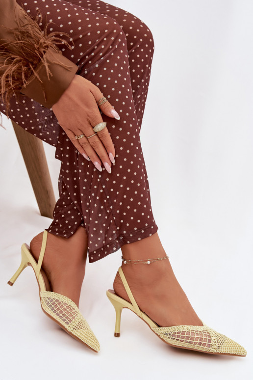 Sandali con elementi traforati e tacchi sottili color giallo "Hanelis"