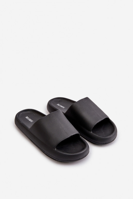 Femminile Pantofole in schiuma leggera Su una suola spessa colore nero Querceria