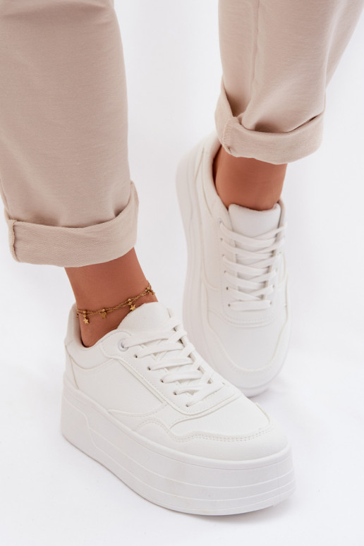 Scarpe modello sneakers Femminile con una piattaforma Colore bianco Feressa