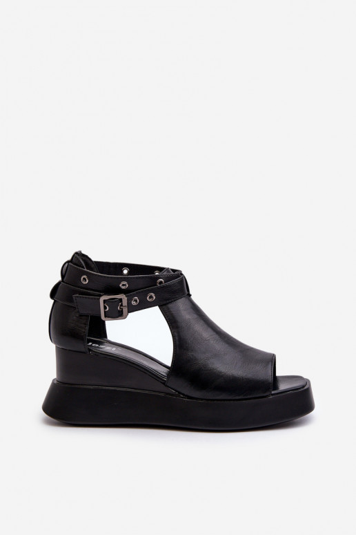 Sandali da donna con una piattaforma I Koturnie in ecopelle colore nero Hloeli