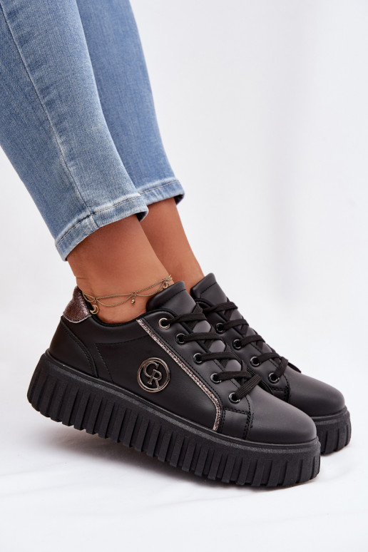 Scarpe modello sneakers Femminile con una piattaforma Con decorazioni Detalem colore nero Iselora