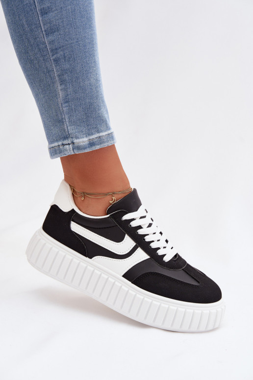 Scarpe modello sneakers Femminile con una piattaformain ecopelle scamosciatau colore nero Cadrina