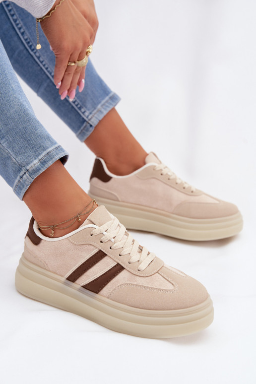 Scarpe modello sneakers Femminile con una piattaforma beige Galleria