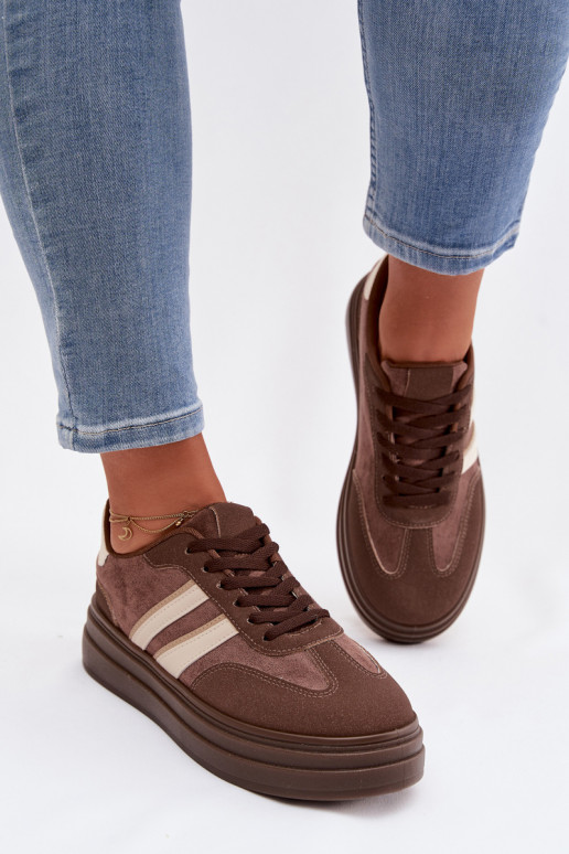 Scarpe modello sneakers Femminile con una piattaforma colore marrone Galleria