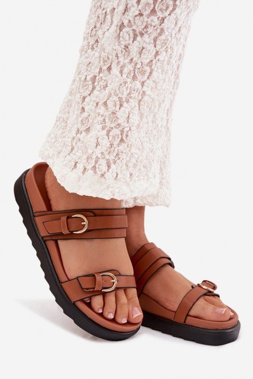 Pantofole da donna con una piattaforma con strisce I colore doratomi con fibbiemi colore marrone Rirea