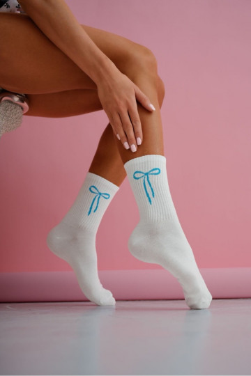 Calze da donna bianche con fiocco blu