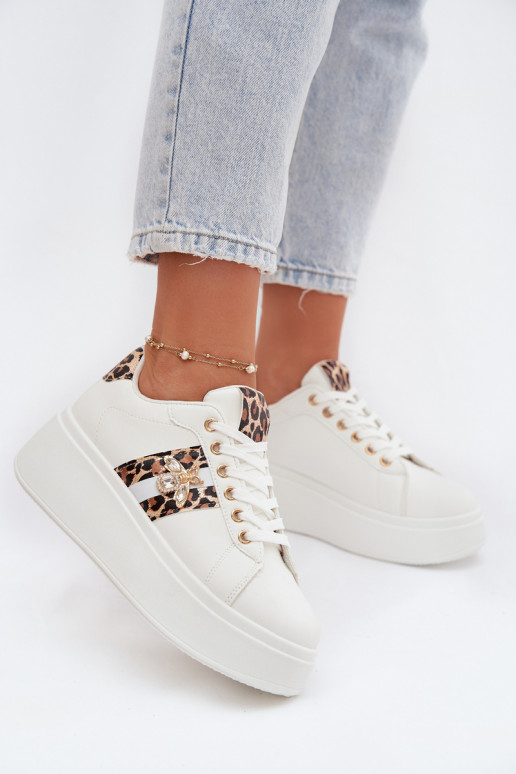 Scarpe modello sneakers Femminile con una piattaformaPrzypinką Colore bianco con motivi di pelliccia di leopardo Palvessa