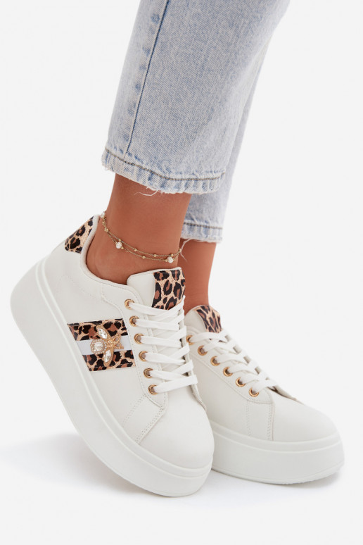 Scarpe modello sneakers Femminile con una piattaformaPrzypinką Colore bianco con motivi di pelliccia di leopardo Palvessa