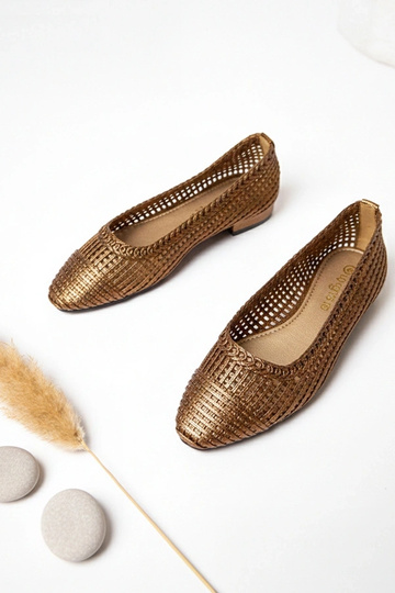 Ballerine marroni traforate...