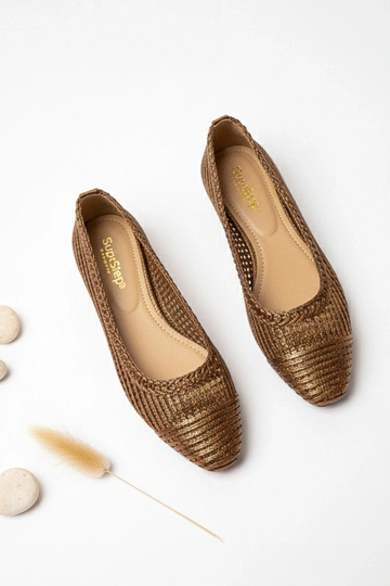 Ballerine marroni traforate... 2