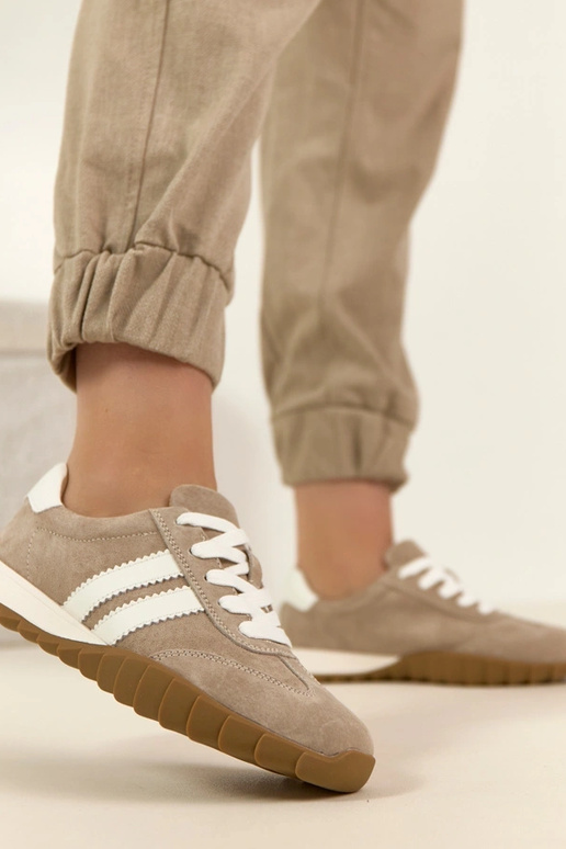 Scarpe sportive in pelle sabbiose...