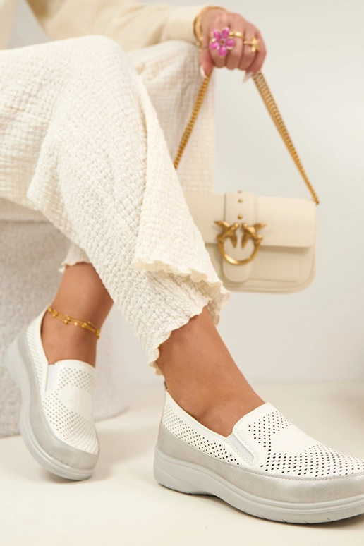 Mezze scarpe a rete bianche argentate...