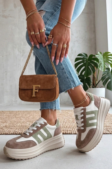 Scarpe in pelle beige con...