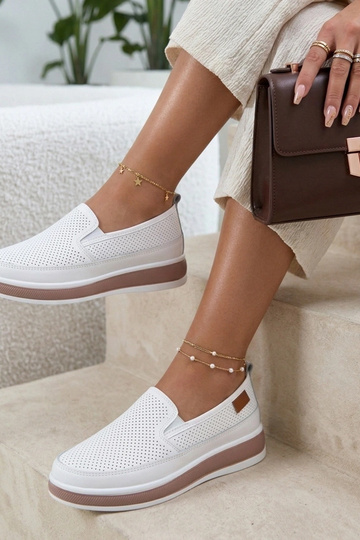 Scarpe in pelle bianche con...