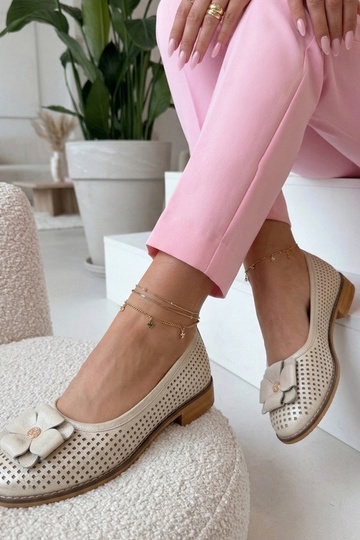 Ballerine in pelle dorata...