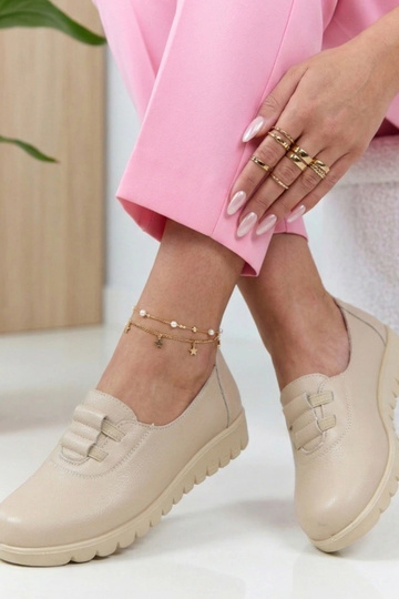 Stivaletti color sabbia con...