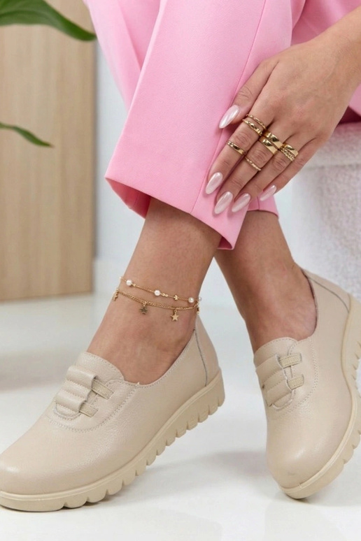 Stivaletti color sabbia con tacco...